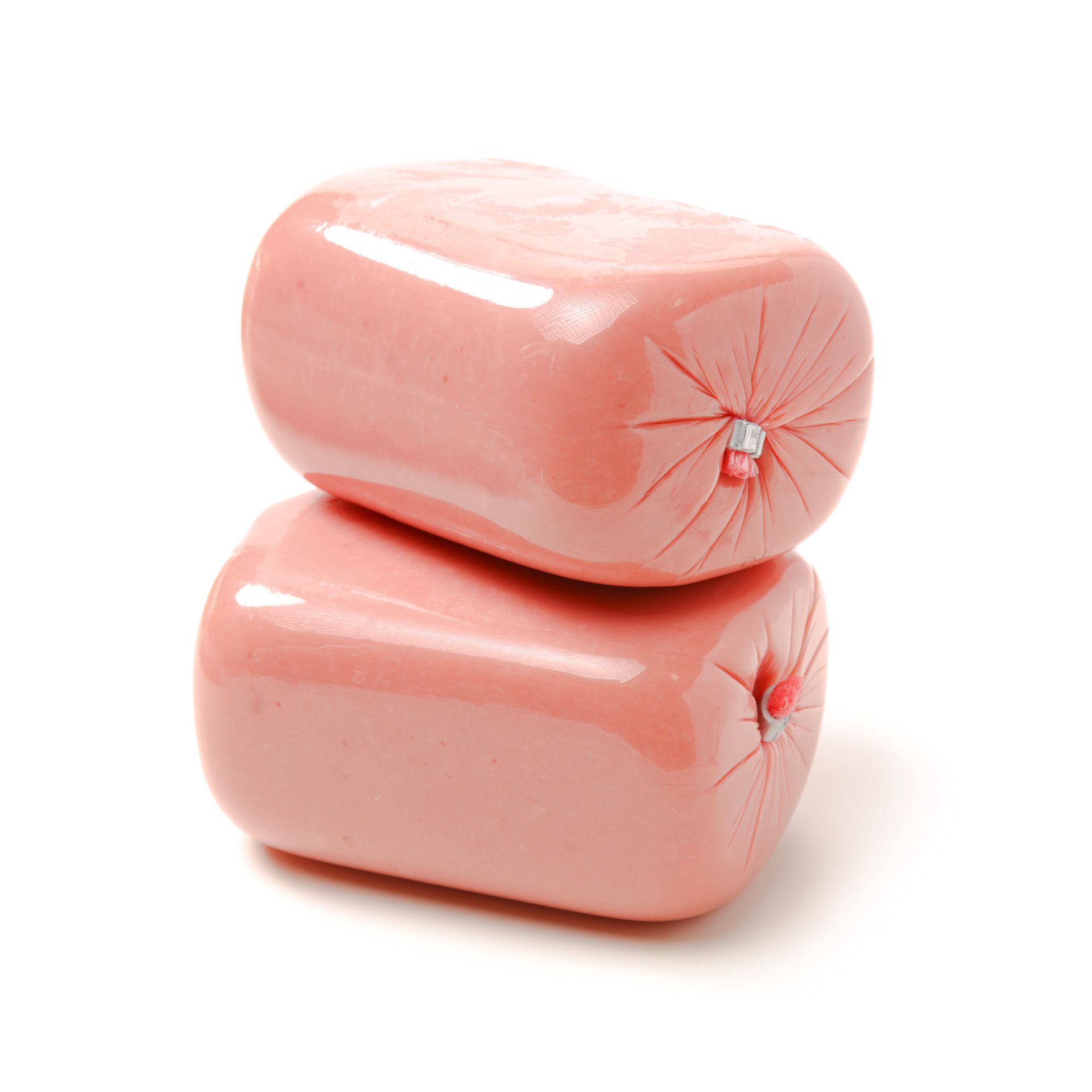 Two pieces of ham in transparent sausage casings